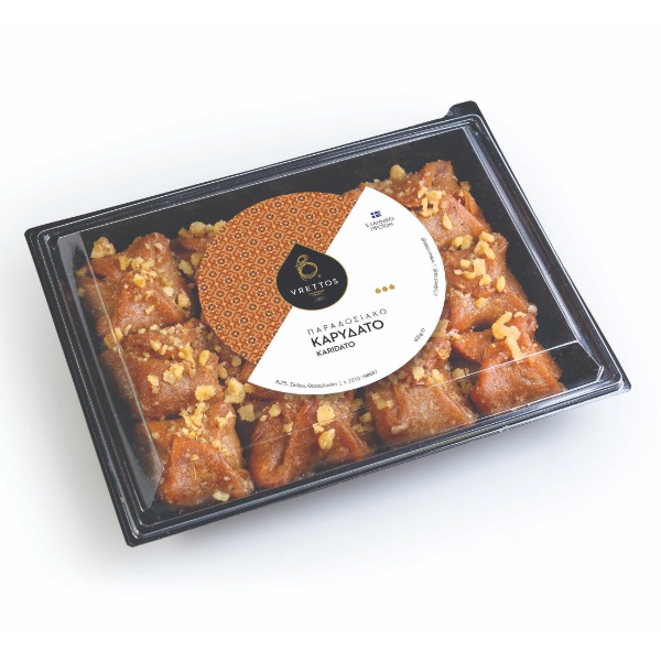 “vrettos” karydato traditional greek sweet in pet dish with transparent cover