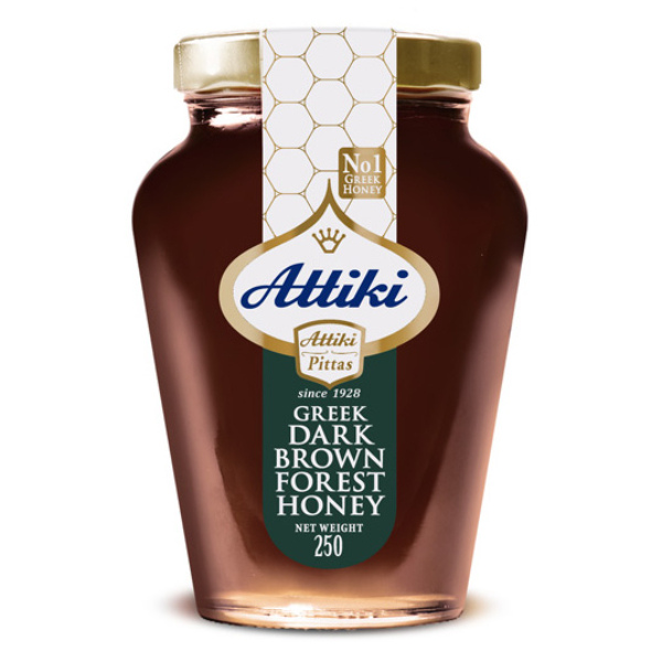 “attiki” dark forest honey from oak and conifer trees in jar