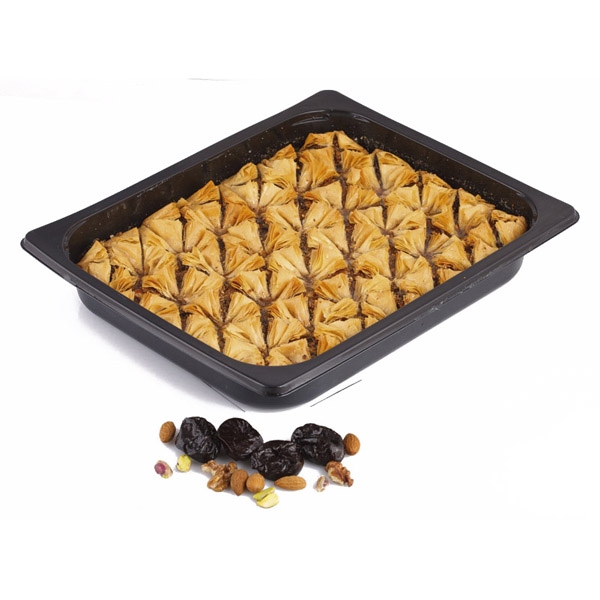 “vrettos” traditional greek sweet with crispy thin dough and dried plums and nuts in syrup cut in 42 portions (frozen) in c-pet dark dish
