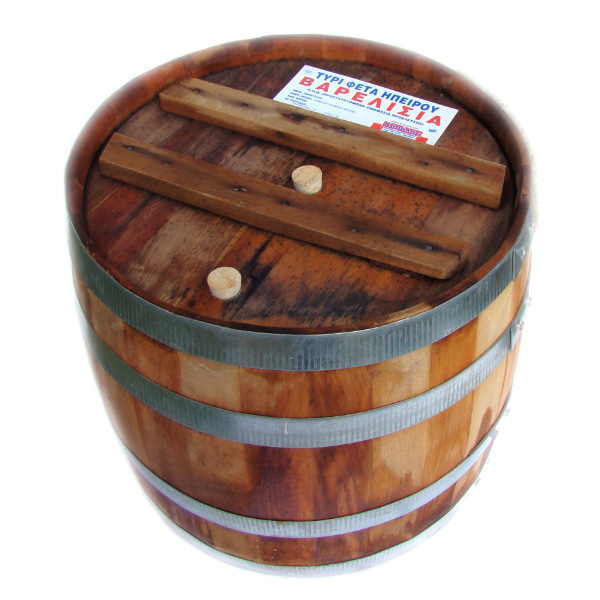 “karalis” feta cheese varelissia (p.d.o.) in wooden barrel